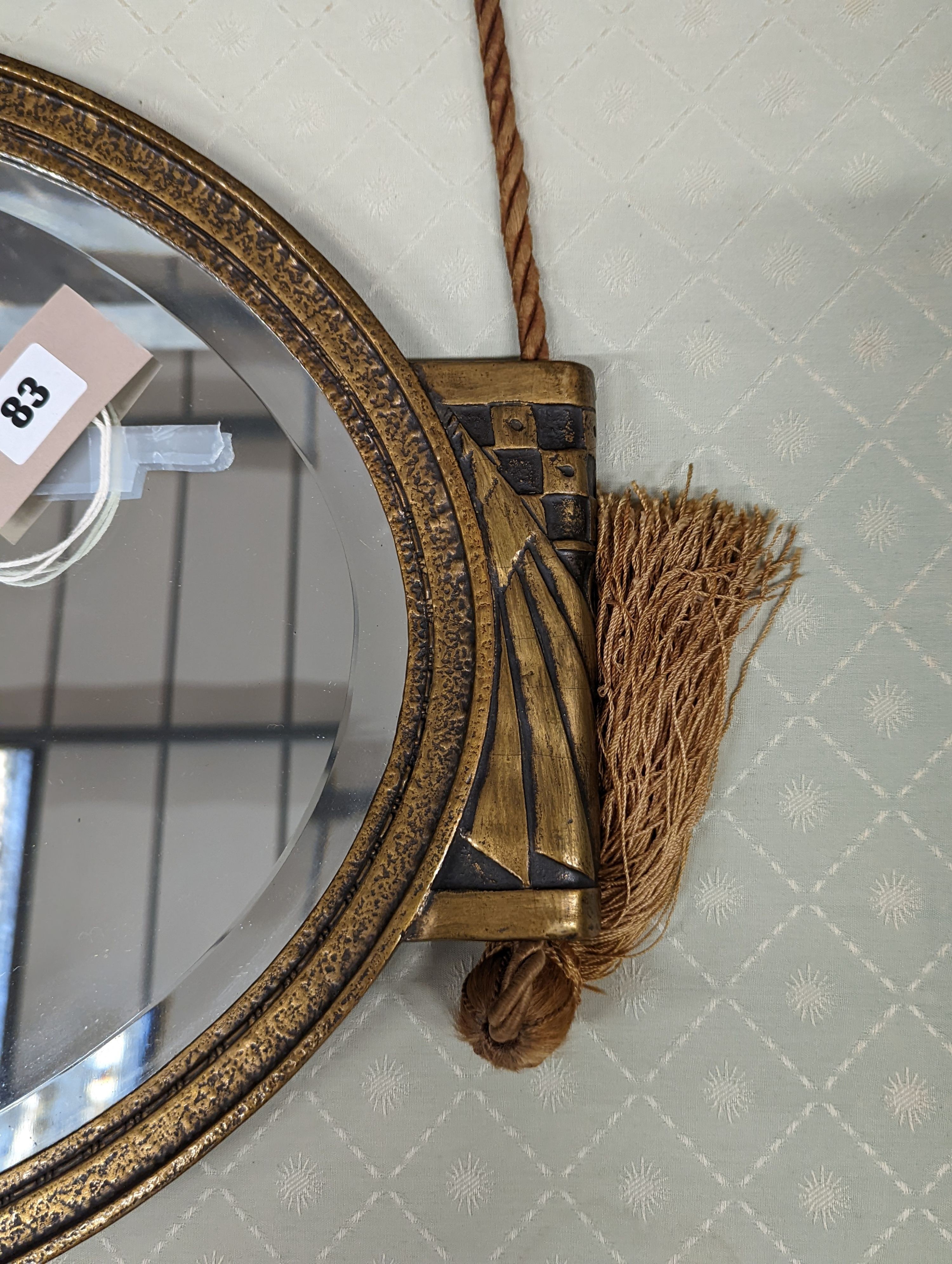 An Art Deco style oval wall mirror, width 74cm, height 43cm